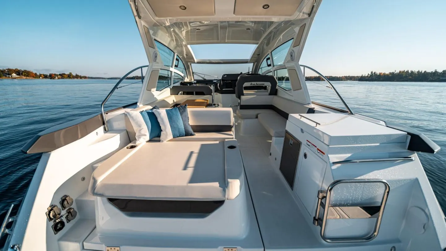 The cockpit and sun pad of a Beneteau Gran Turismo 36 on open water